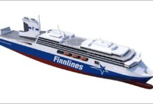 Large Grimaldi Group ferry with Wärtsilä propulsion sailing on calm blue waters.