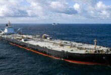 The oil tanker MT Divina navigates waters, representing global oil shipping.