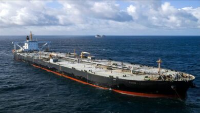 The oil tanker MT Divina navigates waters, representing global oil shipping.