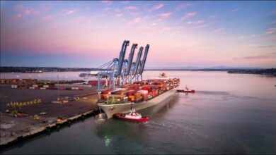 Bustling Port of Tacoma with container ships and cranes, symbolizing ocean freight.