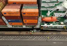A containership connected to a shore power station at Hamburg Port.