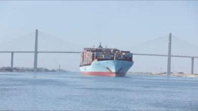 A massive container ship transits the Suez Canal for Maersk's expanded Asia-Europe services.
