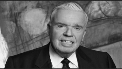 German transportation magnate Klaus-Michael Kühne smiles in a professional portrait.
