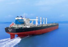 Anemoi rotor sails visible on a large Taiwanese bulk carrier at sea.