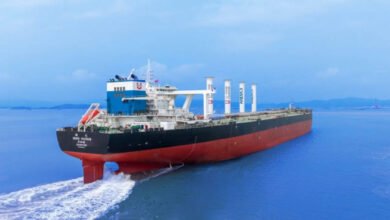 Anemoi rotor sails visible on a large Taiwanese bulk carrier at sea.