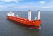 KCC's MV Baltazar, a large wind-assisted cargo vessel, sails on the ocean.