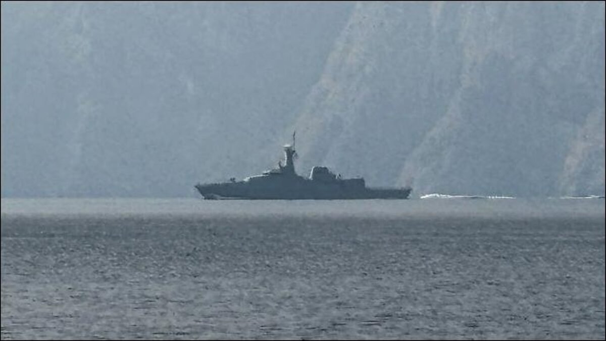 A large container ship navigates a vital shipping lane in the Red Sea.