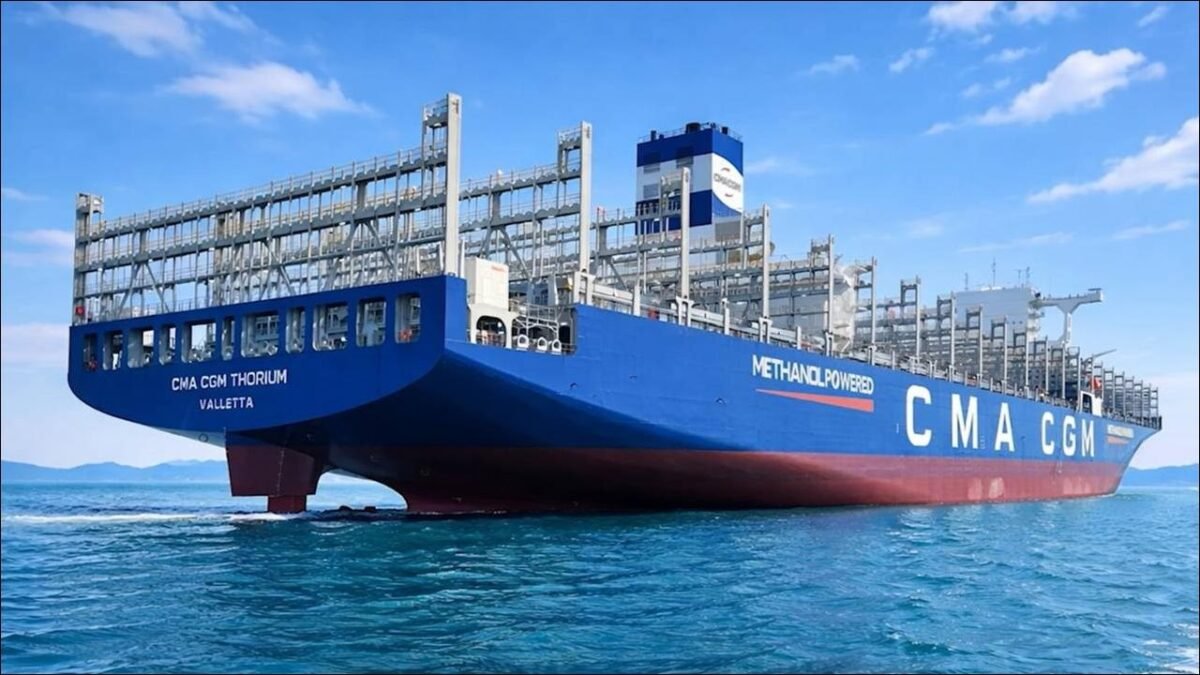 A large CMA CGM methanol-powered containership sails at sea.