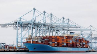 A large Maersk container ship sails on the ocean, reflecting new strategic orders.