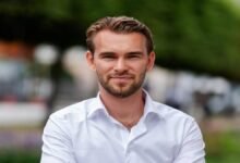 Tue Raguse, CEO of Ofiniti, in a professional portrait.