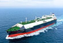 The Alpha Gas LNG carrier Energy Endurance sails on calm blue water.