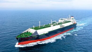 The Alpha Gas LNG carrier Energy Endurance sails on calm blue water.