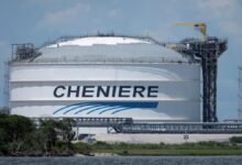 A large liquefied natural gas (LNG) carrier sailing on the ocean.