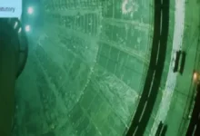 A large container ship navigates the ocean, a subject of new marine fuel guidelines.