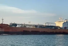 A large liquefied petroleum gas (LPG) carrier ship sailing on the ocean.