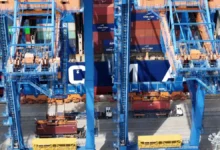 Large container ship sailing on the ocean, central to green shipping corridor initiatives.