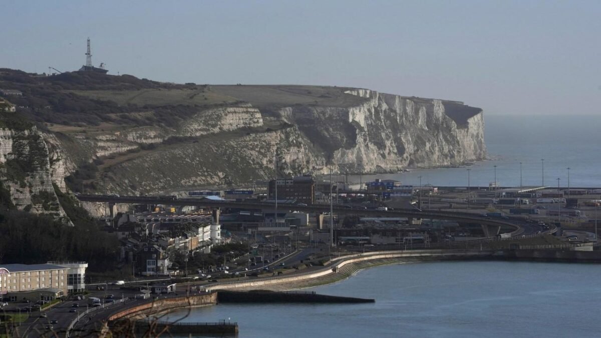 Masked anti-immigration protesters block road at Port of Dover.