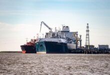 Titan Vision LNG bunker vessel loading at Klaipeda port.