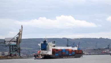 The Dubai Tower, China's Arctic container service vessel, navigates calm waters upon its UK arrival.