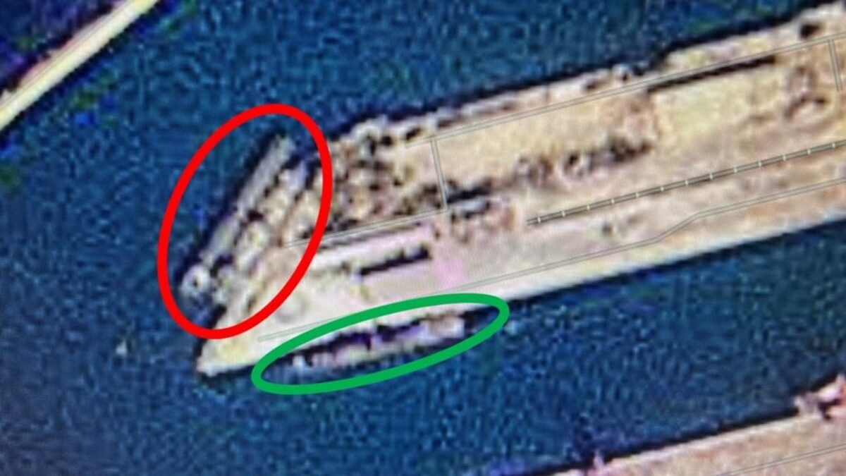 A large Russian military cargo ship sails on the open sea.