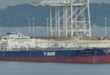Modern aframax tanker Green Adventure sails on the ocean.