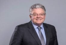 John Pearson, Global CEO of DHL Express, poses for a professional portrait.