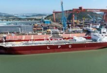 Nakilat's new dual-fuel LPG/ammonia carrier, Energy North, sailing on the water.