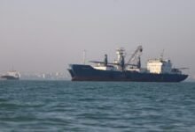 Aerial view of the Strait of Hormuz, a vital shipping passage.