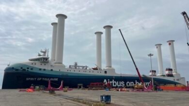 The Spirit of Toulouse RoRo vessel with six white Norsepower rotor sails at sea.