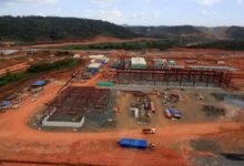 Simandou iron ore mining site in Guinea, linked to China Merchants' freight deal.