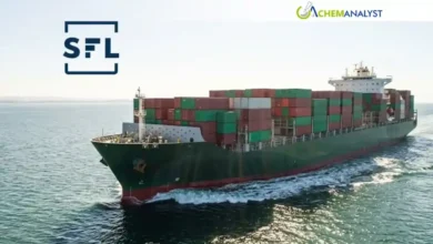 A large Very Large Ammonia Carrier (VLAC) ship sailing on the open ocean.