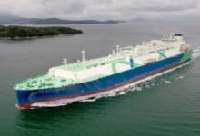The MISC dual-fuel LNG carrier Th'ailib sails on open water.