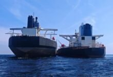Two large tankers at sea, suspected of illegal ship-to-ship transfer off Malaysia.