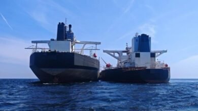 Two large tankers at sea, suspected of illegal ship-to-ship transfer off Malaysia.