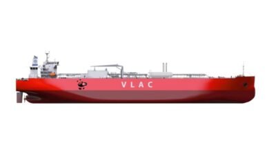 An advanced Very Large Ammonia Carrier (VLAC) ship sailing at sea.